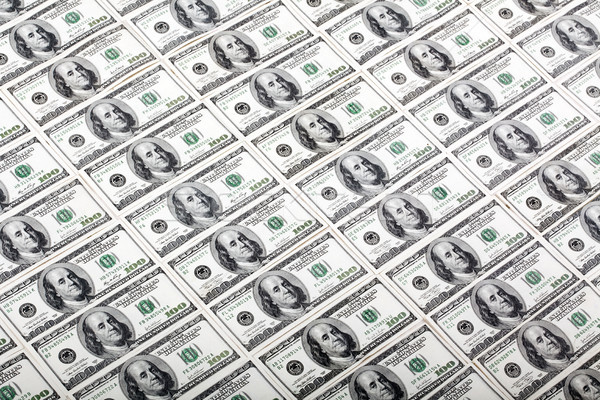 One Hundred Dollar Bills Background - Diagonal Stock photo © eldadcarin