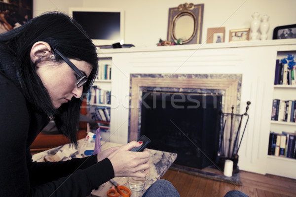 Using Smartphone at Living Room Stock photo © eldadcarin