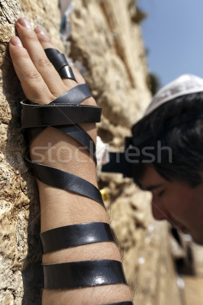 Phylacteries Wrapped Hand on the Western Wall Stock photo © eldadcarin
