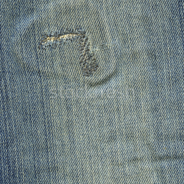 Denim Fabric Texture - Stitched Worn Out Blue Stock photo © eldadcarin