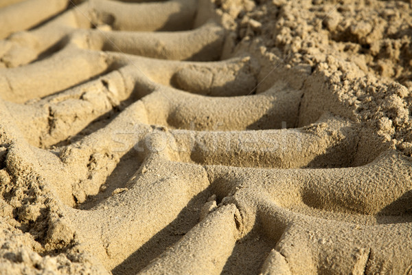 Tire Tracks in the Sand - Close Up Stock photo © eldadcarin