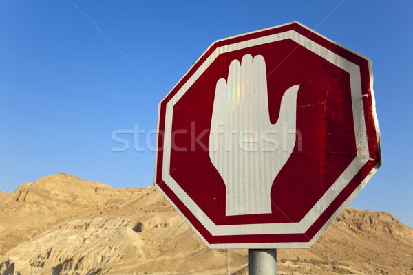 Damaged Stop Sign in the Desert Stock photo © eldadcarin