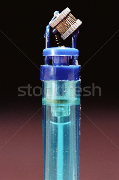 Stock photo: Malfunctioning Used Blue Lighter