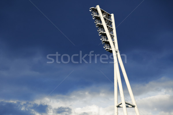 Stadium Lighting Tower and Cloudy Sky Stock photo © eldadcarin
