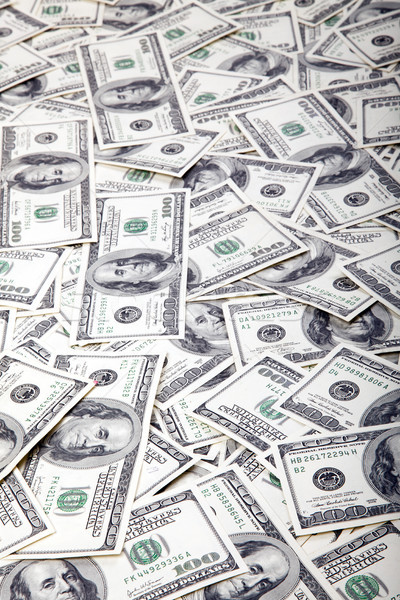 One Hundred Dollar Bills Background - Mess Stock photo © eldadcarin