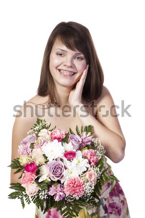 Fiatal nő virágcsokor mosolyog kaukázusi különböző virágok Stock fotó © Elegies