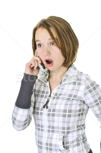 Teenage girl talking on phone Stock photo © elenaphoto