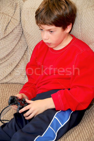 Boy video game Stock photo © elenaphoto