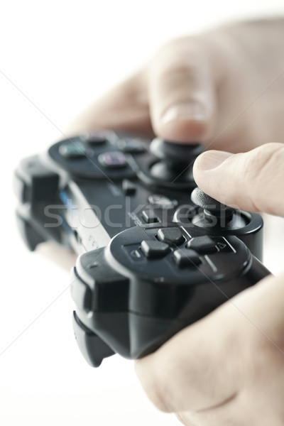 Hands with game controller Stock photo © elenaphoto