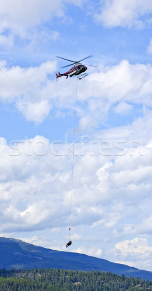 Kurtarmak helikopter dağlar kişi halat dağ Stok fotoğraf © elenaphoto