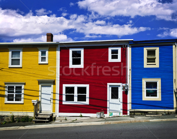 Colorido casas colina terranova Canadá cielo Foto stock © elenaphoto