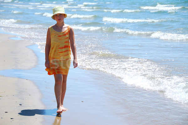 Girl walk beach Stock photo © elenaphoto