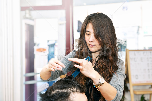 Pelo estilista de trabajo feliz peluquero Foto stock © elenaphoto