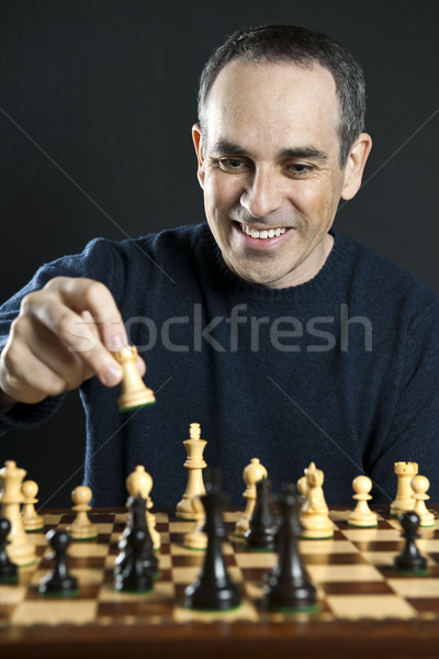 Man playing chess Stock photo © elenaphoto
