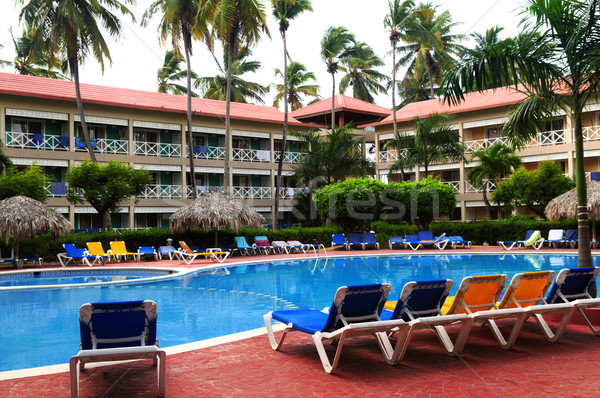 Schwimmbad Unterkunft tropischen Resort Baum Gebäude Stock foto © elenaphoto