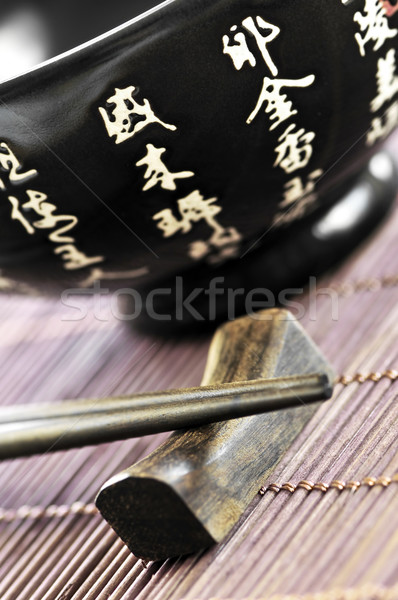 Rice bowl and chopsticks Stock photo © elenaphoto