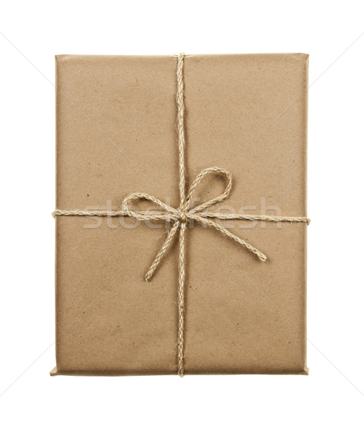 Gift in brown paper tied with string Stock photo © elenaphoto