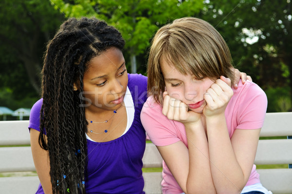 Stock photo: Teenager consoling her friend