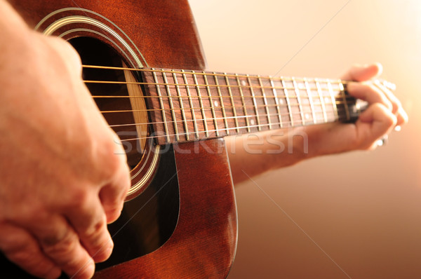 Person playing a guitar Stock photo © elenaphoto