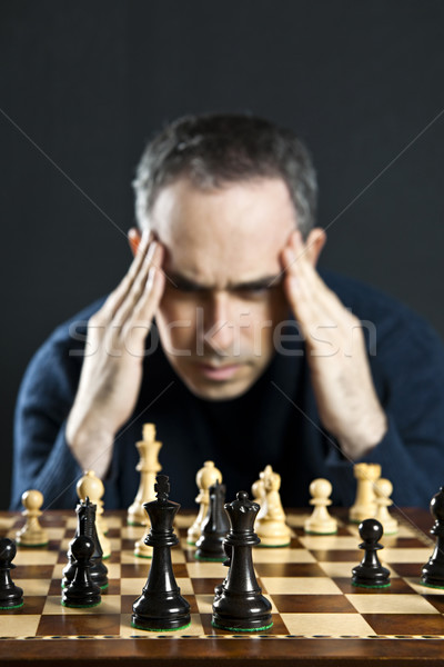 Férfi sakktábla sakktábla gondolkodik sakk stratégia Stock fotó © elenaphoto