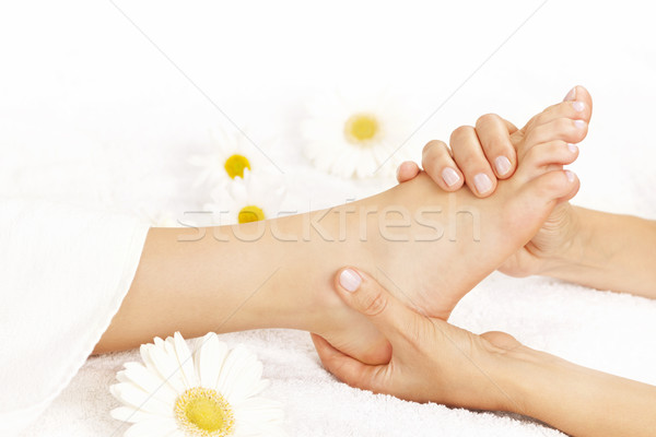 Foot massage Stock photo © elenaphoto