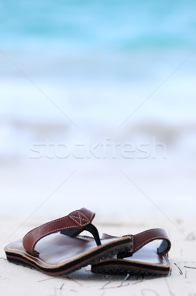 Zandstrand zanderig oceaan strand zomervakantie vrouw Stockfoto © elenaphoto