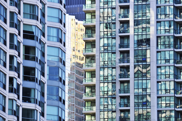 [[stock_photo]]: Appartement · bâtiments · ville · construction · verre