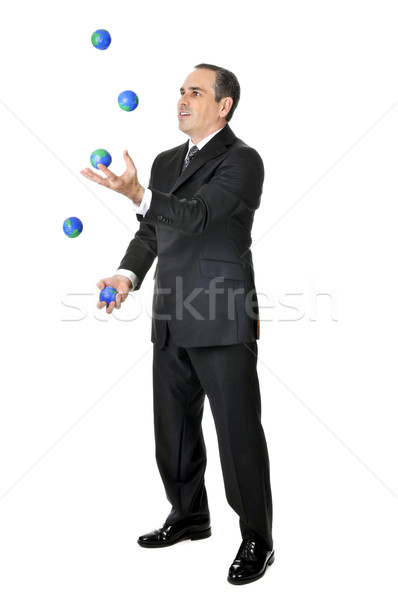 Businessman juggling Stock photo © elenaphoto