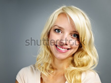 Smiling young woman portrait Stock photo © elenaphoto