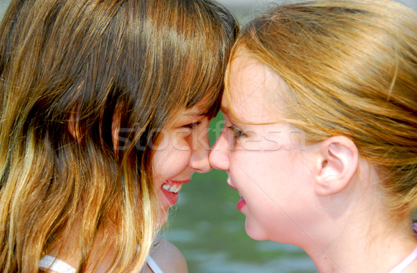 Two girls faces Stock photo © elenaphoto
