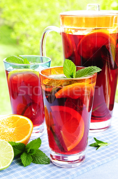 Gyümölcs szemüveg frissítő ital üveg levelek Stock fotó © elenaphoto