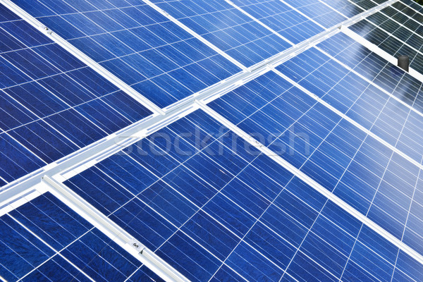 Painéis solares alternativa energia fotovoltaica azul Foto stock © elenaphoto