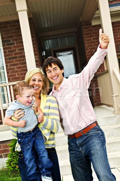 Excited family at home Stock photo © elenaphoto