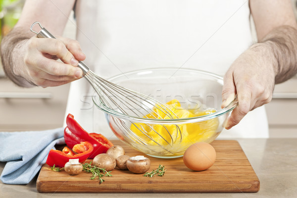 Stock photo: Whisking eggs in bowl