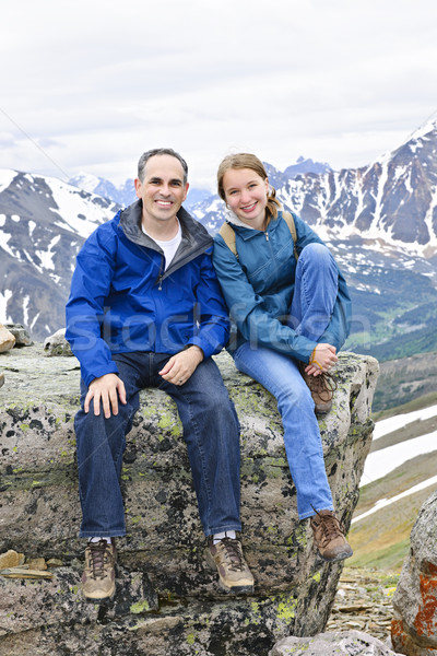 Father and daughter in mountains Stock photo © elenaphoto