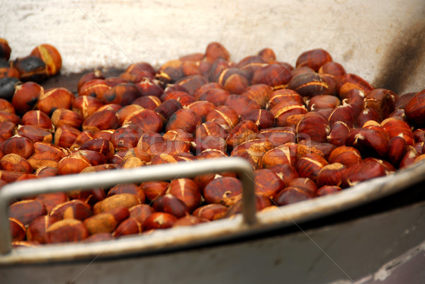 Roasting chestnuts Stock photo © elenaphoto