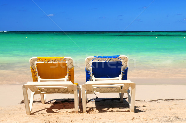Chairs on sandy beach Stock photo © elenaphoto