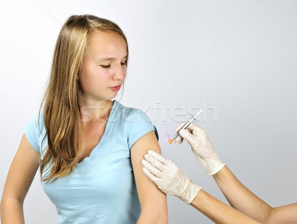 Imagine de stoc: Fată · gripa · shot · ac · vaccinare