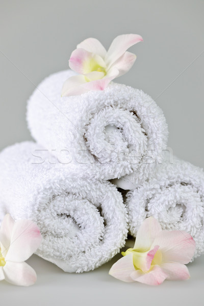 White rolled up spa towels Stock photo © elenaphoto