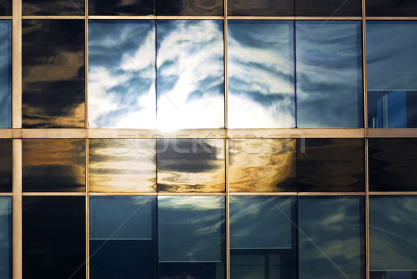 Sky reflecting in office windows Stock photo © elenaphoto