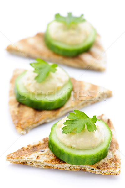 Appetizer of pita with hummus and cucumber Stock photo © elenaphoto