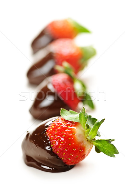 Strawberries dipped in chocolate Stock photo © elenaphoto