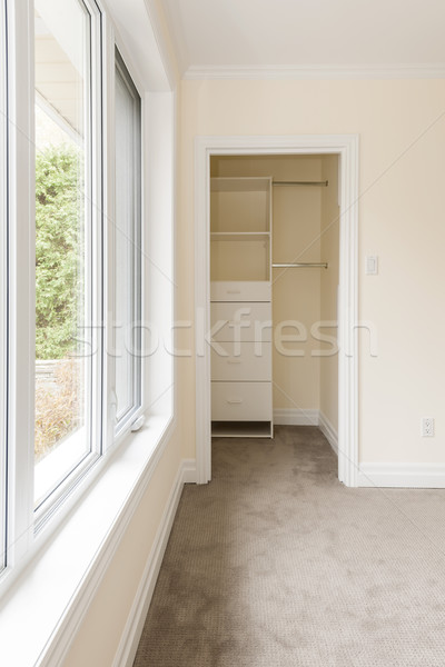 Empty bedroom with window and closet Stock photo © elenaphoto