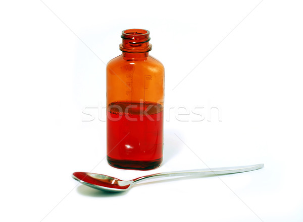 Kaszel syrop biały butelki łyżka lekarza Zdjęcia stock © elenaphoto