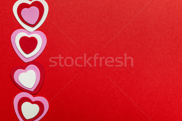 Red Valentines day background with hearts Stock photo © elenaphoto