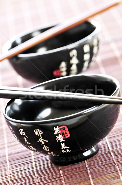 Rijst kommen eetstokjes twee restaurant Stockfoto © elenaphoto