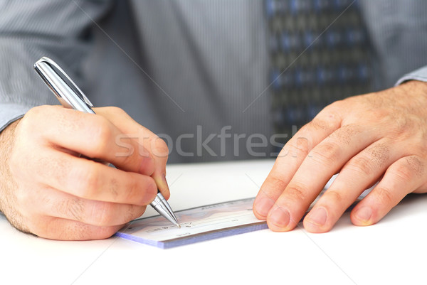 Schriftlich überprüfen Hände Scheck Business Stock foto © elenaphoto