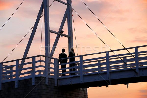 пару смотрят закат пешеходный мост Мэн Сток-фото © elenaphoto
