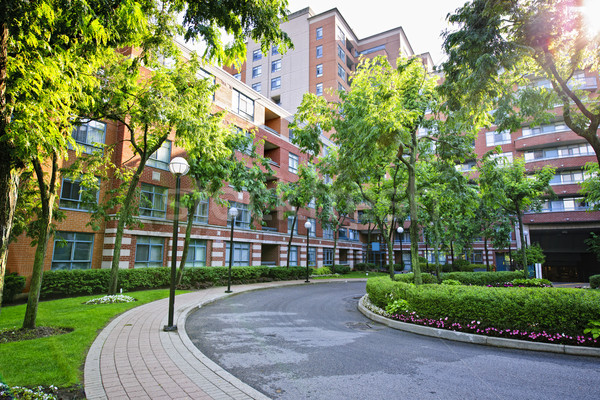 Stock photo: Condo building and driveway
