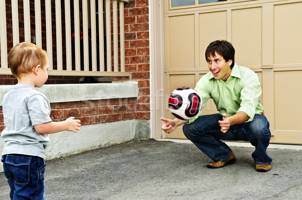 Stok fotoğraf: Baba · oğul · oynama · futbol · baba · öğretim · oğul